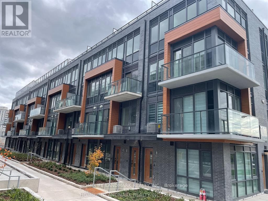 Row / Townhouse – 69 - 71 CURLEW DRIVE, Toronto – photo 1