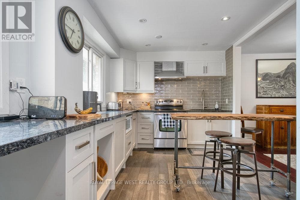 Row / Townhouse – 3 - 92 TWENTY NINTH STREET, Toronto – photo 1